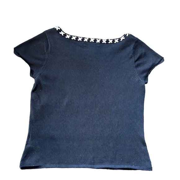 August Silk Logic black top. White criss crossed ribbons throughout neckline. - Picture 2 of 4